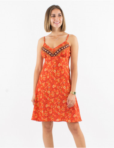 Short polyester dress with straps and daisy print