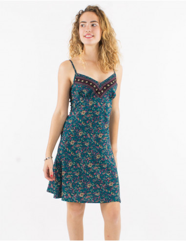 Short polyester dress with straps and daisy print