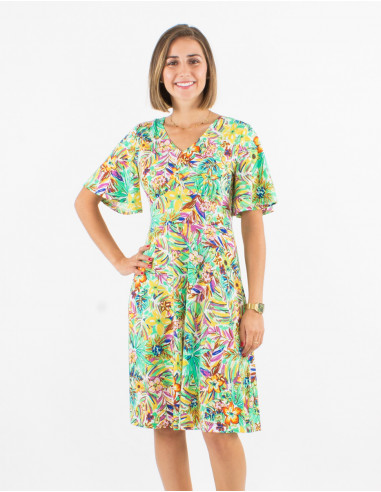 Knitted 96% polyester 4% elastane dress with short sleeves and oasis print