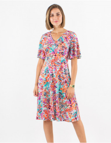 Knitted 96% polyester 4% elastane dress with short sleeves and oasis print