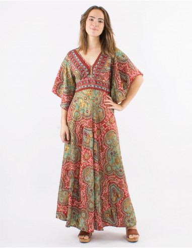 Long polyester butterfly dress with short sleeves and "magic dore" print