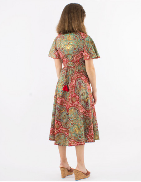 Long polyester wrap dress with short sleeves and "magic dore" print