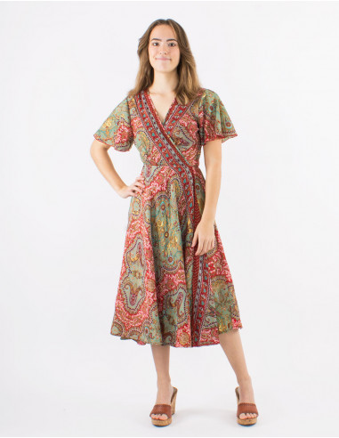 Long polyester wrap dress with short sleeves and "magic dore" print