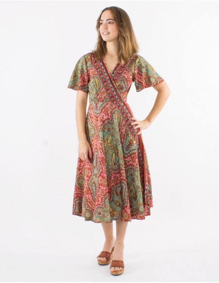 Long polyester wrap dress with short sleeves and "magic dore" print