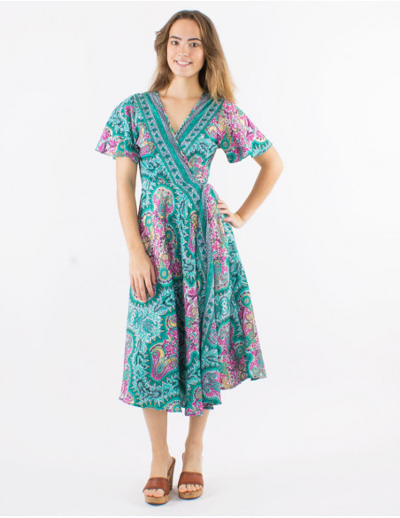 Long polyester wrap dress with short sleeves and "magic dore" print