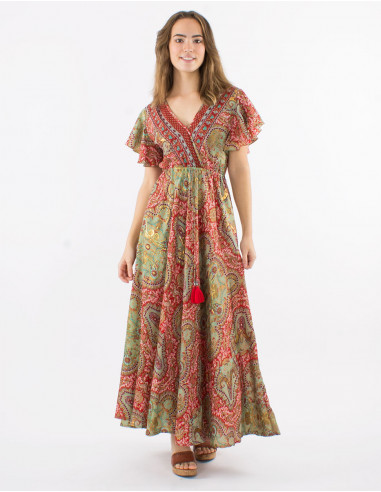 Long polyester dress with short sleeves and "magic dore" print