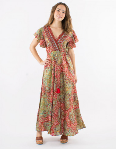 Long polyester dress with short sleeves and "magic dore" print
