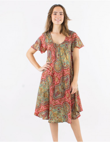 Polyester dress with short sleeves and "magic dore" print