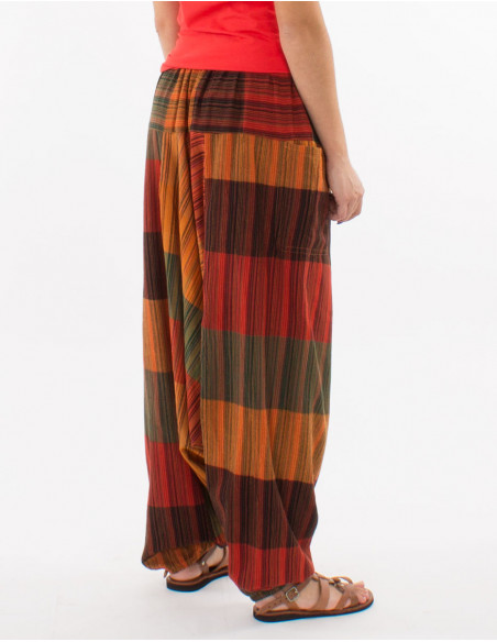 Cotton striped harem pants with pockets on the sides and elastic belt