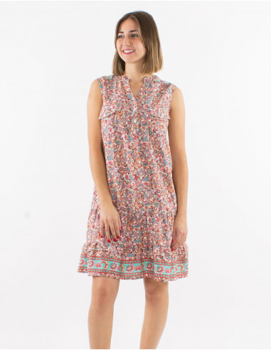 Polyester sleeveless dress with front pockets and "floral" print