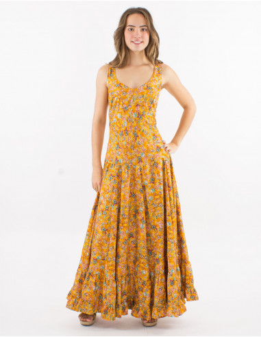 Long polyester dress with large straps and "dore" print