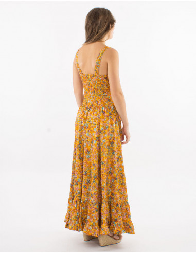 Long polyester dress with large straps and "dore" print
