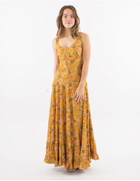 Long polyester dress with large straps and "dore" print