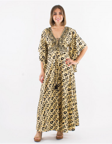 Long polyester dress with short sleeves and "batik" print