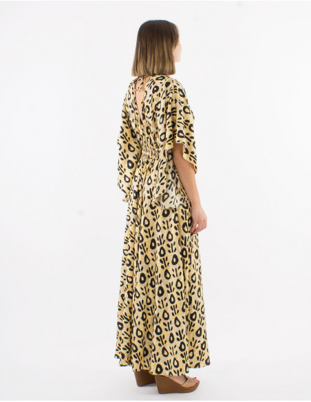 Long polyester dress with short sleeves and "batik" print