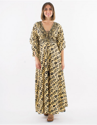 Long polyester dress with short sleeves and "batik" print